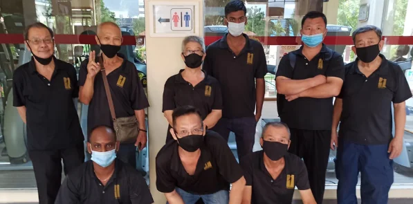Imperial Services on-site cleaning team in company uniform, Singapore